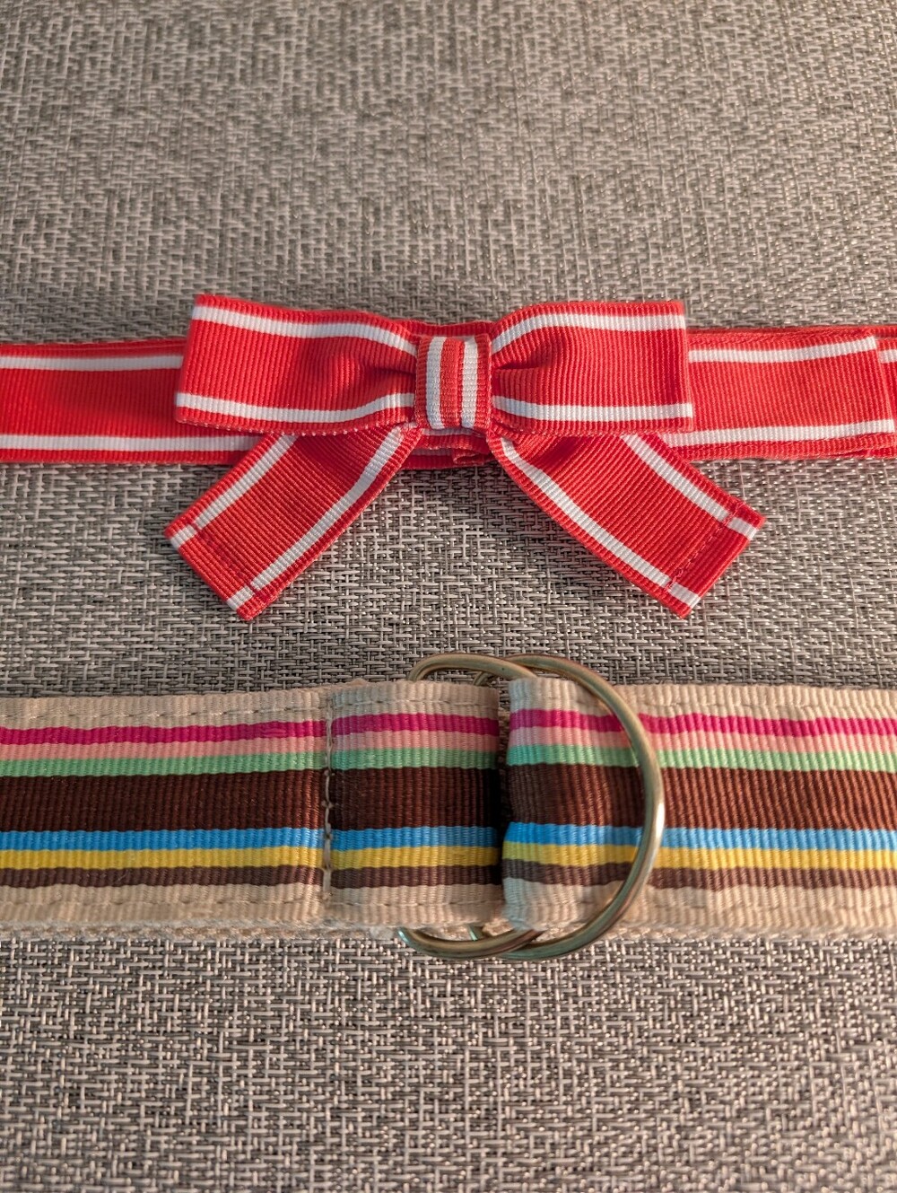 Coral Ribbon-Style Belt and Multicolor Striped Canvas Belt